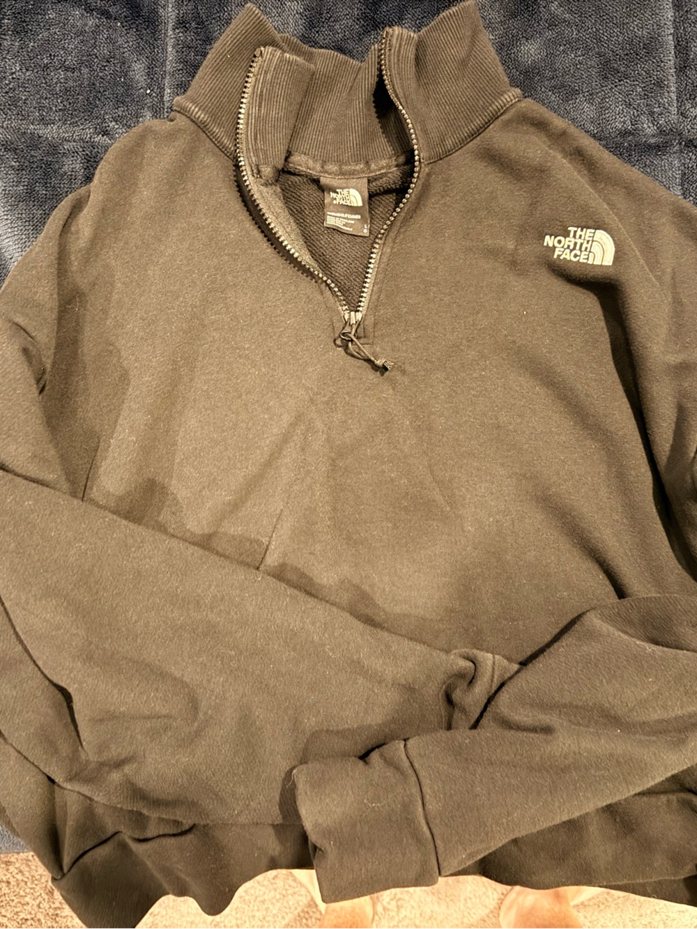 The North Face women’s black Half-Zip Sweater